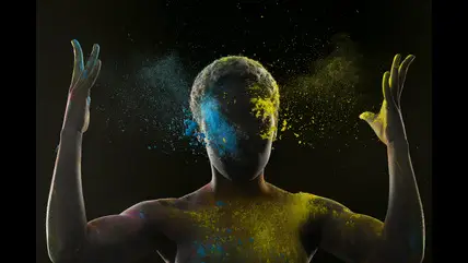 Dopamine brain illustration concept – colorful powder explosion representing brain stimulation and neurotransmitters